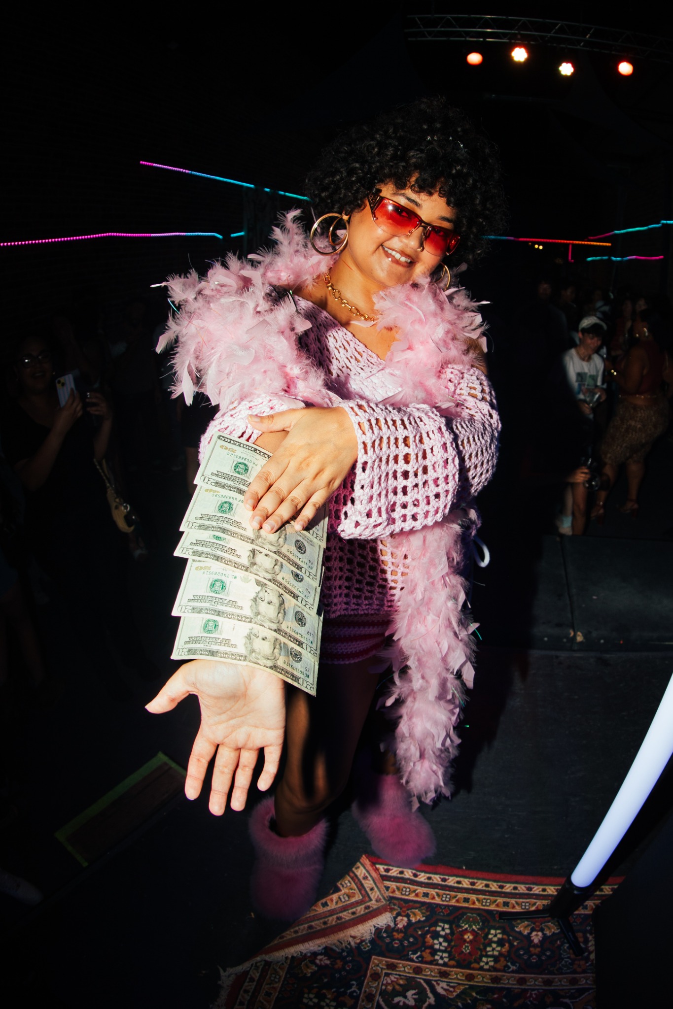 Guest in a pink outfit at TOMBOY